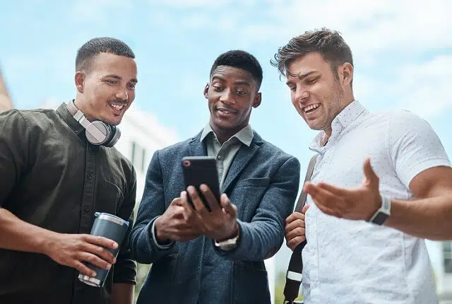 young men investing on smartphone
