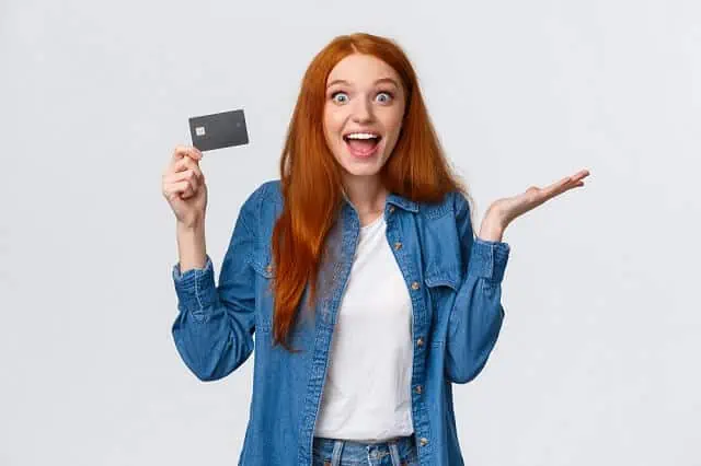 young woman excited about getting a credit card