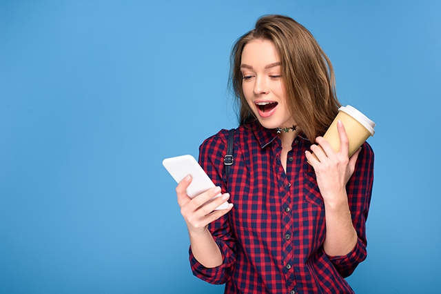 young woman phone excited